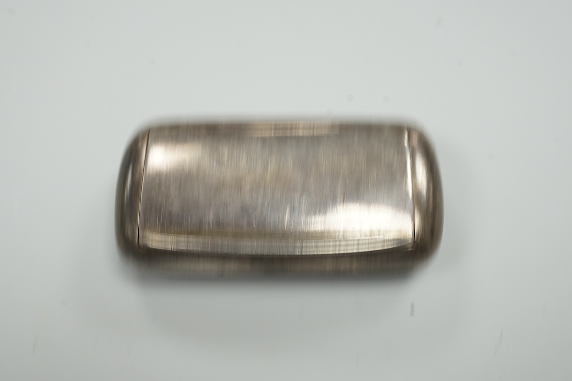 A late Victorian repousse silver navette shaped dish, by Charles Edwards, London, 1894, 25.7cm, with engraved monogram and date, together with a pair of mid 18th century silver sugar nips, an early 19th century silver vi